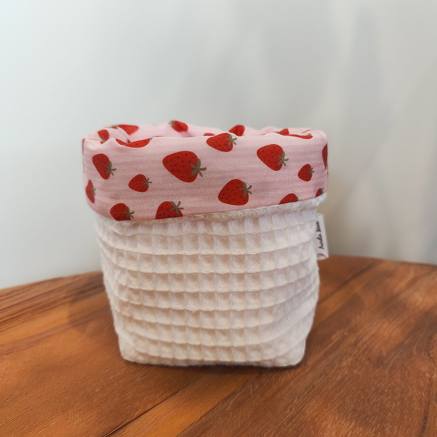 Handmade waffle cotton storage basket with pink strawberry print lining
