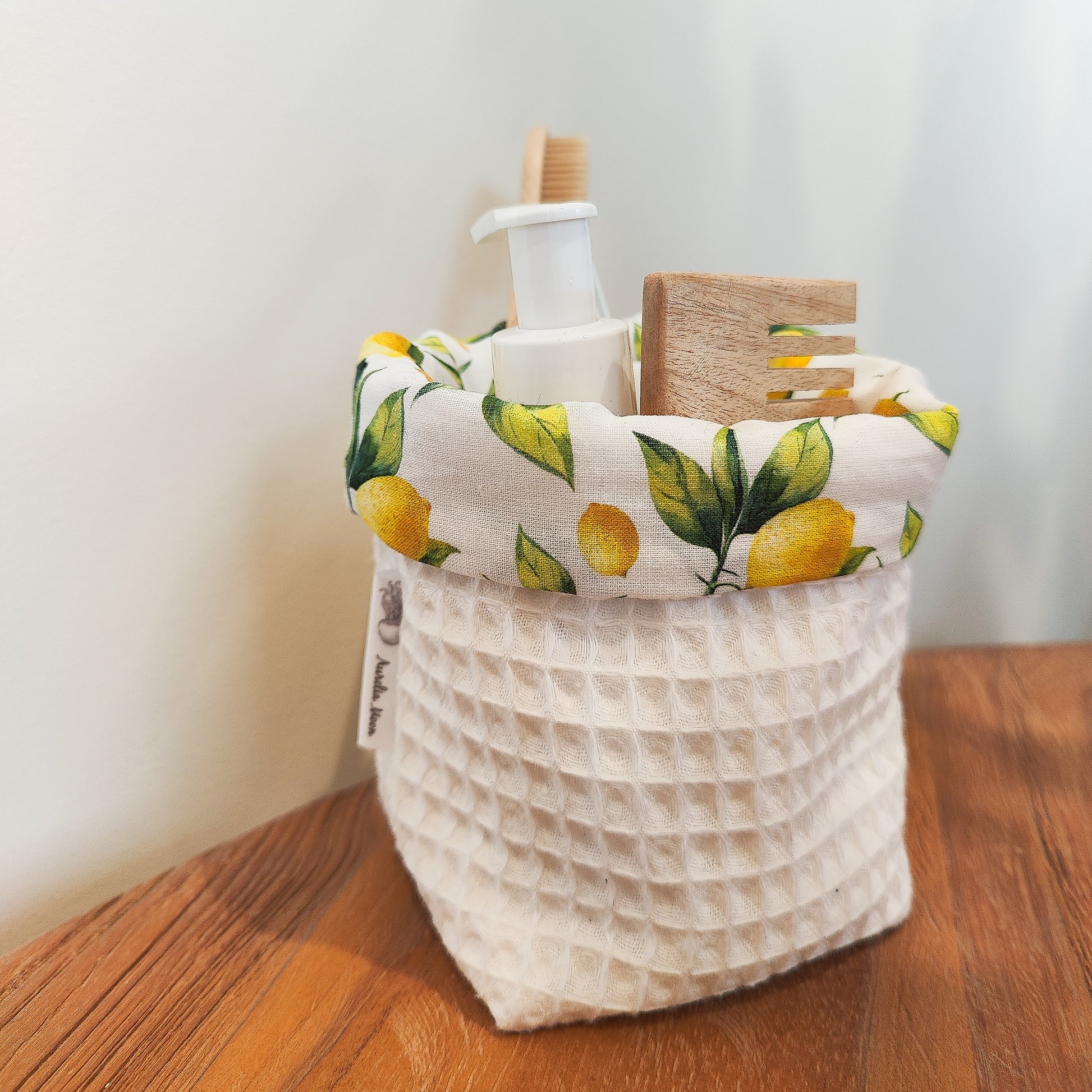 Handmade waffle cotton fabric storage basket with lemon print lining