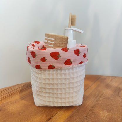 Handmade waffle cotton storage basket with pink strawberry print lining