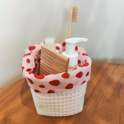 Handmade waffle cotton storage basket with pink strawberry print lining