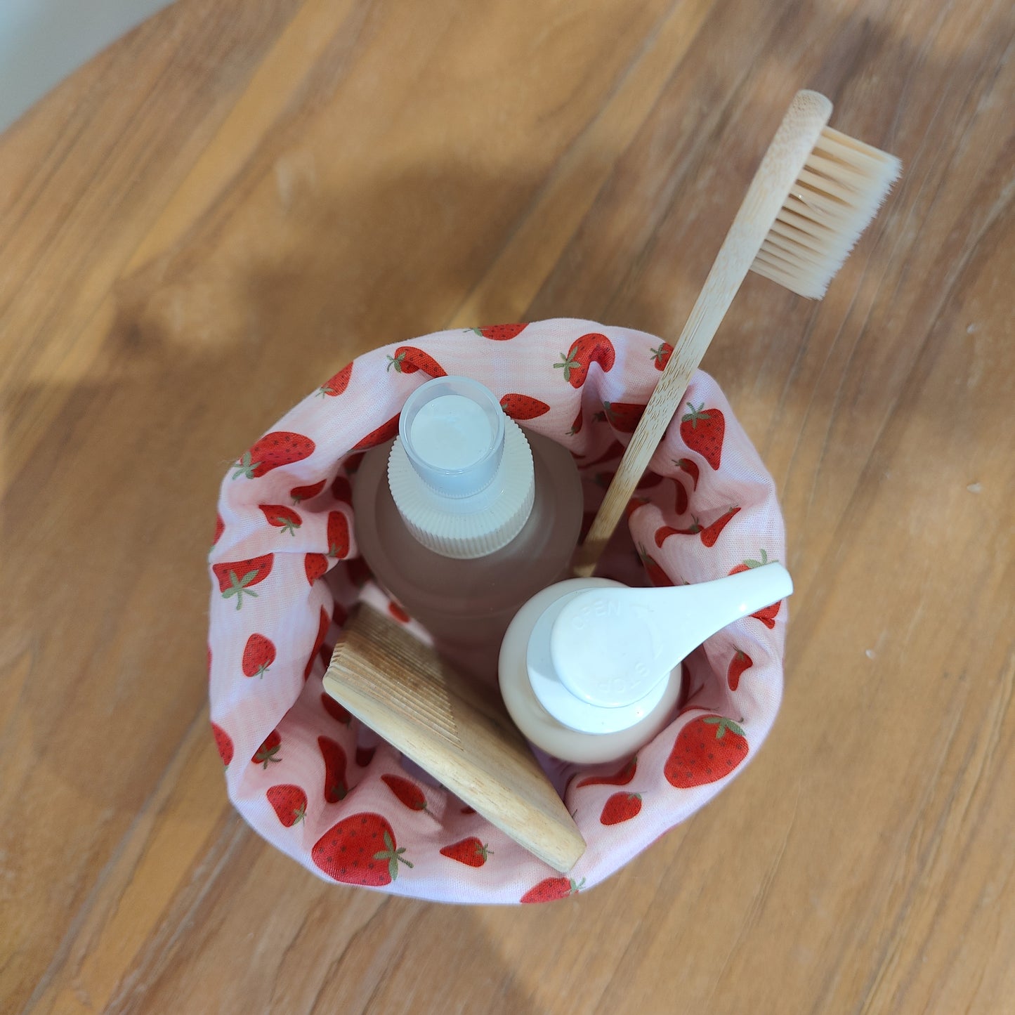 Handmade waffle cotton storage basket with pink strawberry print lining