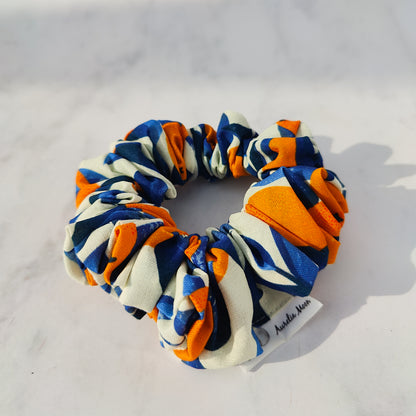 Handmade orange print scrunchie in cotton fabric
