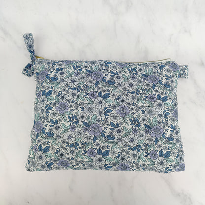 large quilted toiletry travel bag in blue floral print