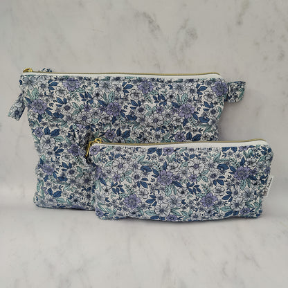 large quilted toiletry travel bag in blue floral print
