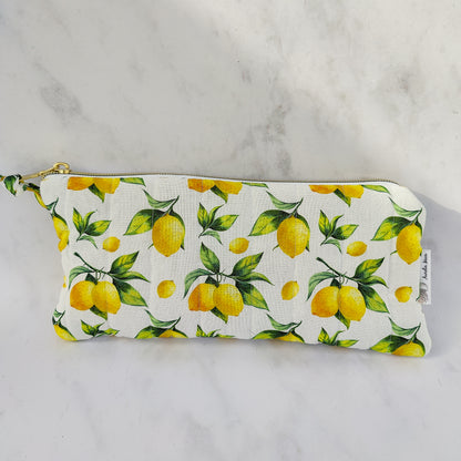 Pouch with lemon pattern on a white background