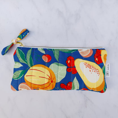 Handmade quilted fruit print zip pouch with cotton waffle lining