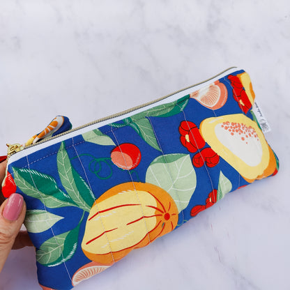 Handmade quilted fruit print zip pouch with cotton waffle lining